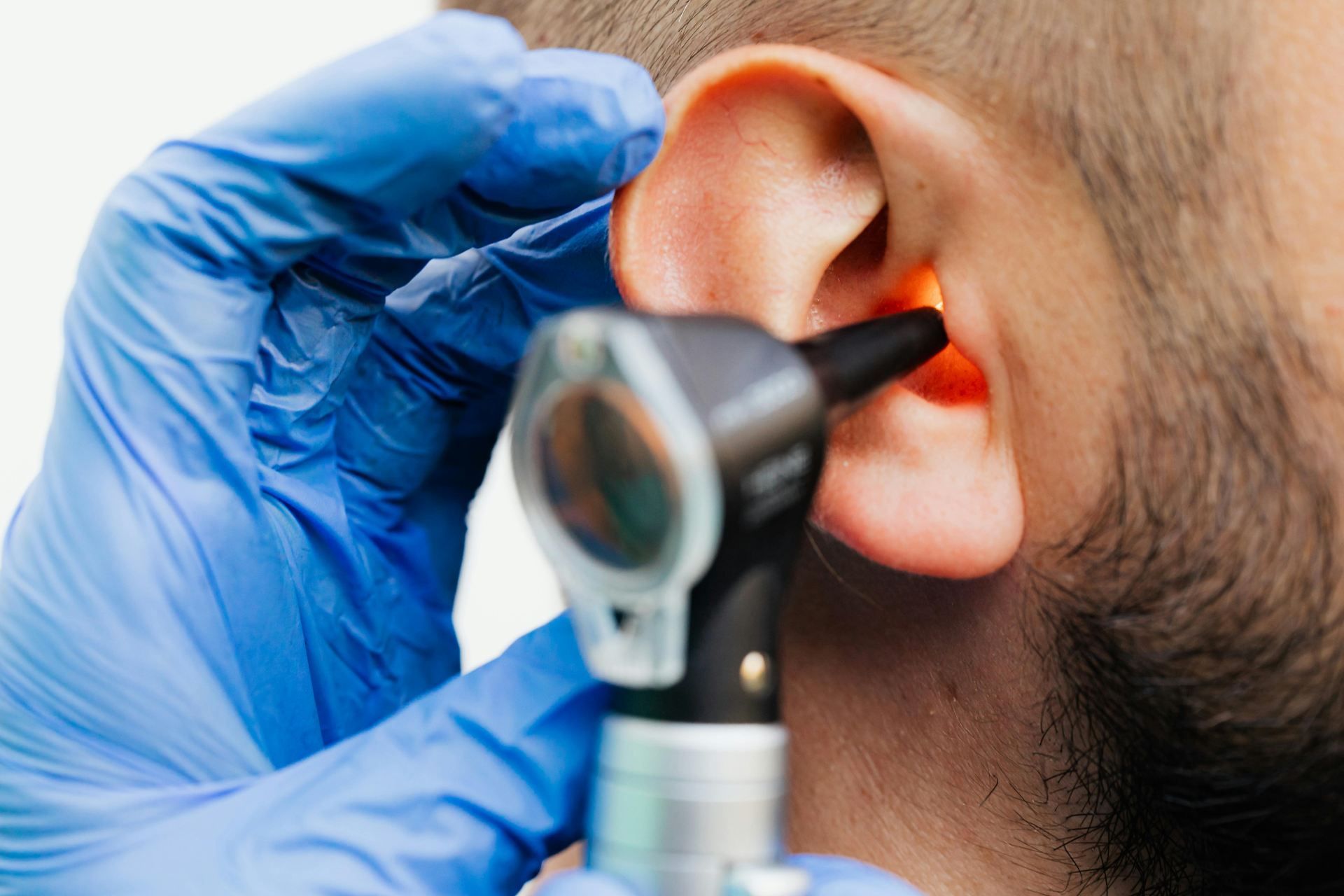 Otoscope examining ear canal